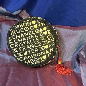 Vintage CHANEL Black and off white Graphic Pouch with Red Tassel make up bag